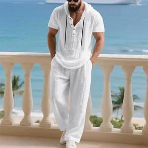 Full body shot of white linen casual set on a scenic beach balcony background