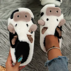 Soft and cute plush cow-themed fuzzy cotton slippers for indoor home warmth and comfort