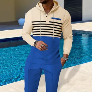 Detailed view of men's waffle knit hoodie and pants set with blue color blocking