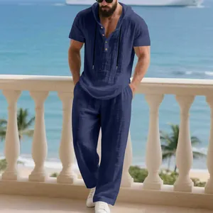 Full view of men's navy blue linen casual hooded Henley shirt and pants set