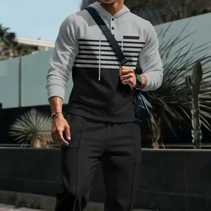 Men's grey and black waffle knit hoodie and trousers two-piece streetwear outfit set