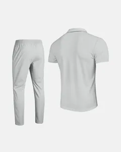 Back view of men's light grey waffle knit short sleeve polo and pants set