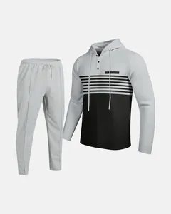 Close-up of men's two-piece waffle knit tracksuit with color-blocked hoodie and joggers