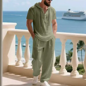 Full body view of men's casual olive green linen hooded Henley and pants set