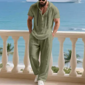 Detail shot of men's casual linen hooded henley shirt and matching pants in sage green