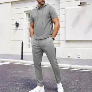 Casual grey waffle knit men's two-piece set featuring hooded short sleeve top