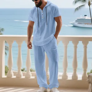 Men's light blue linen hooded Henley shirt and loose pants set for casual beach wear