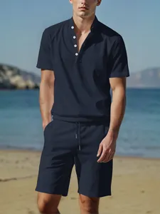 Men's navy cotton linen Henley neck short-sleeved shirt and shorts set on a beach