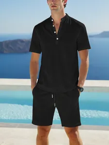 Detail view of men's black cotton linen Henley shirt and casual shorts set