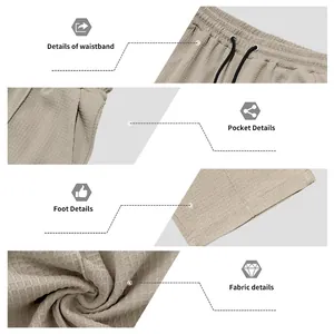 Close-up of men's waffle knit trousers showing waistband, pockets, hem, and fabric details