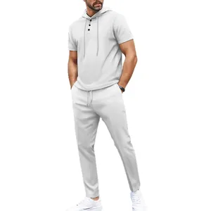Men's stylish white waffle knit two-piece set featuring a short sleeve hoodie and pants