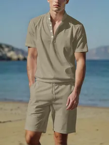 Men's summer khaki cotton-linen Henley shirt and matching shorts set worn by model at beach