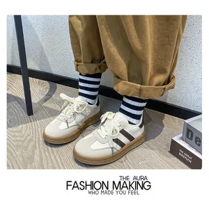 Retro German Army Trainers for women featuring beige leather and brown stripe details