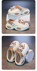 Detailed views of girls' cream and brown cartoon clogs featuring cute rabbit charms.