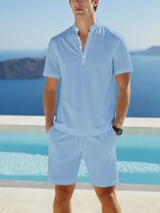 Detailed texture of men's light blue cotton linen short-sleeved Henley shirt set