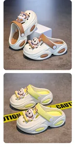 Detailed view of kids' cartoon clogs in beige, brown, and yellow color options