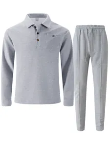 Bequemes graues Waffelstrick-Freizeitset mit langärmligem Poloshirt und langer Hose