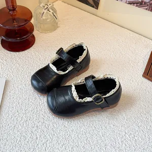 Elegant black girls' princess shoes with white lace trim and comfortable soft soles