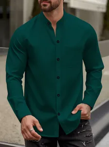 Close-up detail of men's dark green waffle knit shirt with stand collar and chest pocket
