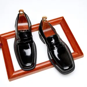 Elegant black glossy patent leather loafers for men with sophisticated square toe design