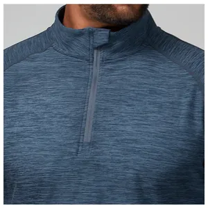 Close-up detail of men's half-zip blue melange athletic top showing fabric texture and collar.