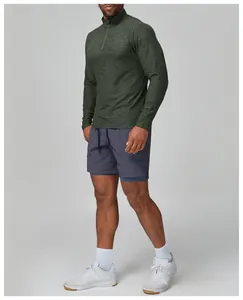 Men's slim fit dark green quarter-zip athletic long sleeve workout shirt for running gym