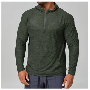 Close-up view of a men's green quick-dry hooded athletic top showing fabric texture.