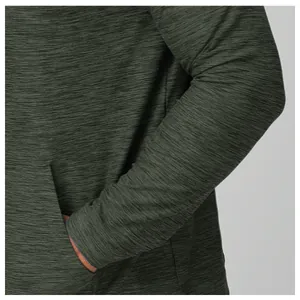 Close-up detail of forest green marled fabric and side pocket on men's athletic hoodie