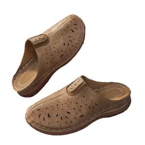 Women's summer hollow-out clogs with metallic studs and laser-cut floral patterns