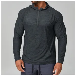 Detail of dark grey heathered hoodie with quarter-zip and kangaroo pocket for gym