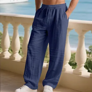 Men's loose navy blue linen trousers with pleats and drawstring waist