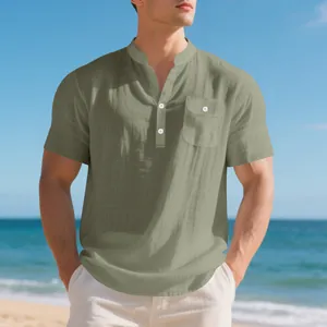 Breathable men's olive green linen Henley shirt with chest pocket detail on beach