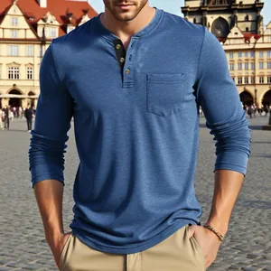 Detailed view of a men's vintage blue long-sleeve Henley shirt with a chest pocket