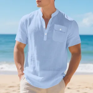 Detail view of a light blue linen Henley shirt featuring a button placket and chest pocket