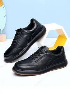 Close-up of black cowhide leather casual shoes with textured grain and soft sole