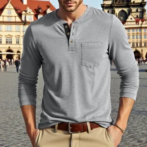 Detailed view of grey long sleeve Henley shirt for men with cotton texture and chest pocket