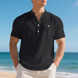Casual black short-sleeved linen Henley shirt for men styled for a summer beach look.