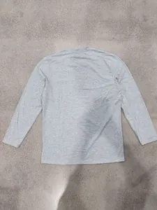 Back view of a casual grey long-sleeved men's T-shirt featuring soft heathered texture