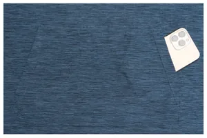 Detail showing kangaroo pocket of blue quick-dry fitness hoodie with mobile phone storage.