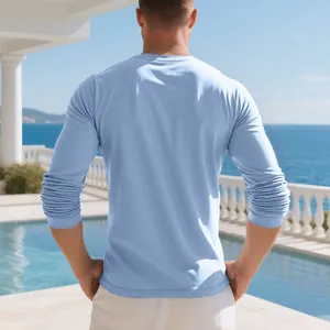 Rear view of a light blue long-sleeve men's casual t-shirt with a relaxed resort fit