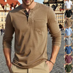 Detailed view of men's long sleeve Henley t-shirt featuring button placket and chest pocket