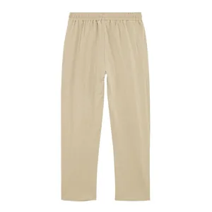 Back view of minimalist beige linen wide-leg trousers featuring elastic waistband.
