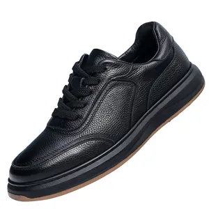 Detailed side view of high-quality black pebbled leather casual men's sneaker with soft sole
