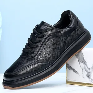 Close-up of black top-layer cowhide men's casual leather shoes with textured finish