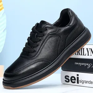 Macro detail of textured black cowhide leather on a premium men's casual sneaker