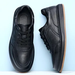 Detail view of breathable black genuine leather men's casual shoes with soft sole