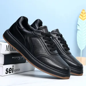 Detail view of black first-layer cowhide men's breathable casual leather shoes.