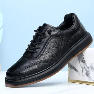 Detailed side view of black pebble grain leather men's casual shoe with no-tie laces.