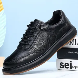Detailed close-up view of premium black first-layer cowhide leather casual shoes for men