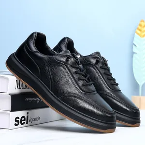 Side view detail of black genuine cowhide leather sneakers with durable gum rubber sole.